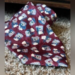 Vintage Wembley tie geometric print with feather details